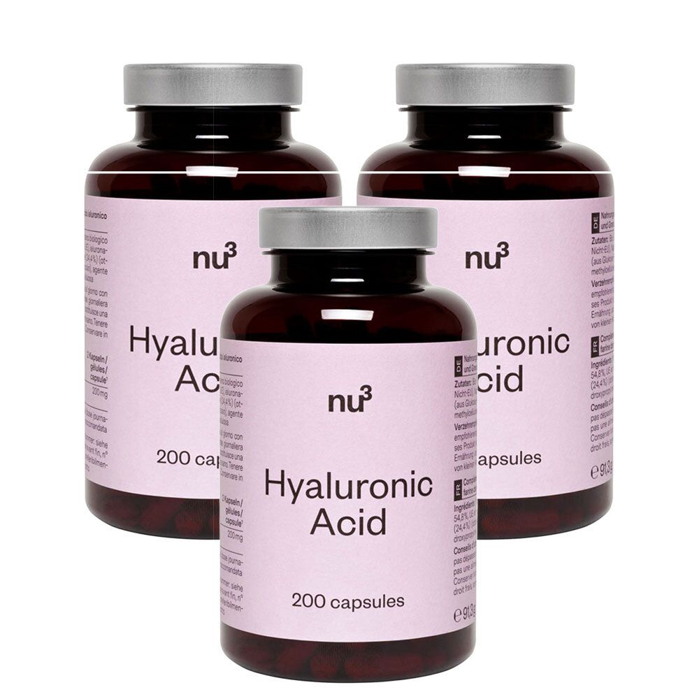 Trois flacons bruns avec des couvercles argentés et des étiquettes roses. Les étiquettes indiquent "nu3 Hyaluronic Acid" et "200 capsules".