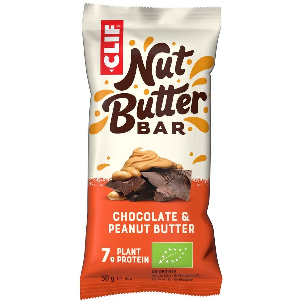 Verpakking van een reep. Opschrift: CLIF Nut Butter Bar, Chocolate & Peanut Butter. Bevat 7g plantaardige eiwitten. Bio-keurmerk.
