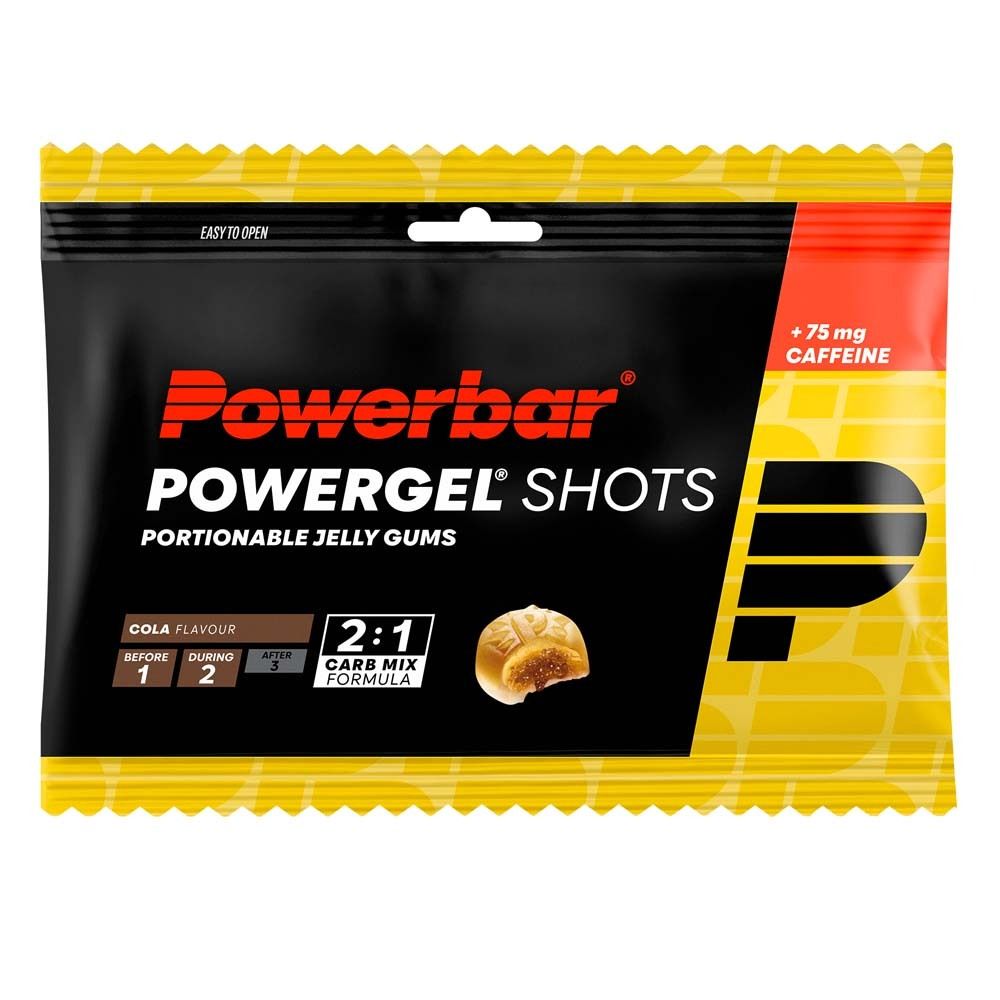 Powerbar Powergel Shots Cola. Emballage noir avec accents jaunes. Nom du produit et logo visibles. Contient de la caféine.
