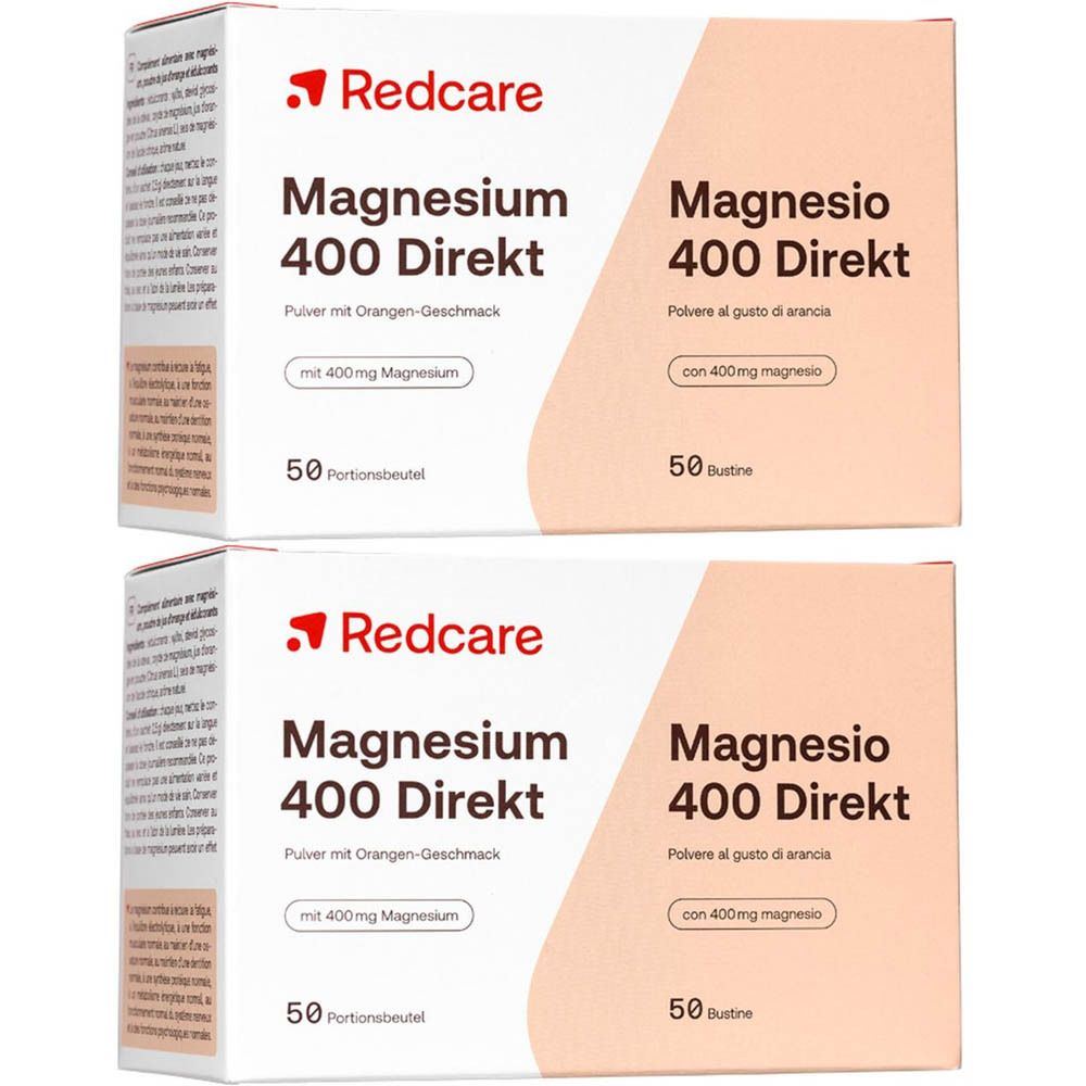 Deux boîtes de Redcare Vita Magnesium 400 Direkt. Boîtes blanches avec des accents violets et des informations en allemand et italien.