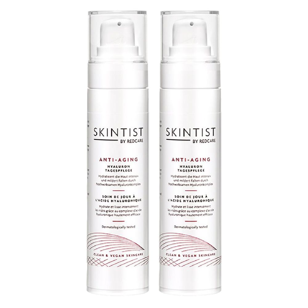 Deux flacons blancs SKINTIST ANTI-AGING Hyaluron Tagespflege avec pompe. Texte en allemand et en anglais.
