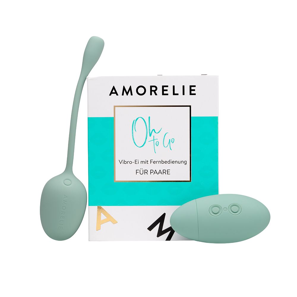 Oeuf vibrant menthe avec télécommande et emballage. AMORELIE Oh To Go est écrit sur l'emballage.