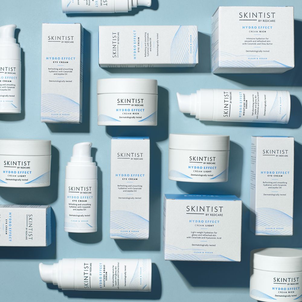 Divers produits. Crème pour les yeux, crème et emballages SKINTIST HYDRO EFFECT. Inscription : Testé dermatologiquement, Vegan.