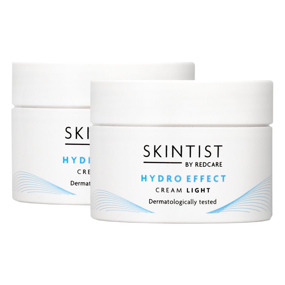 Deux pots blancs de SKINTIST HYDRO EFFECT Cream Light. Texte: Testé dermatologiquement.