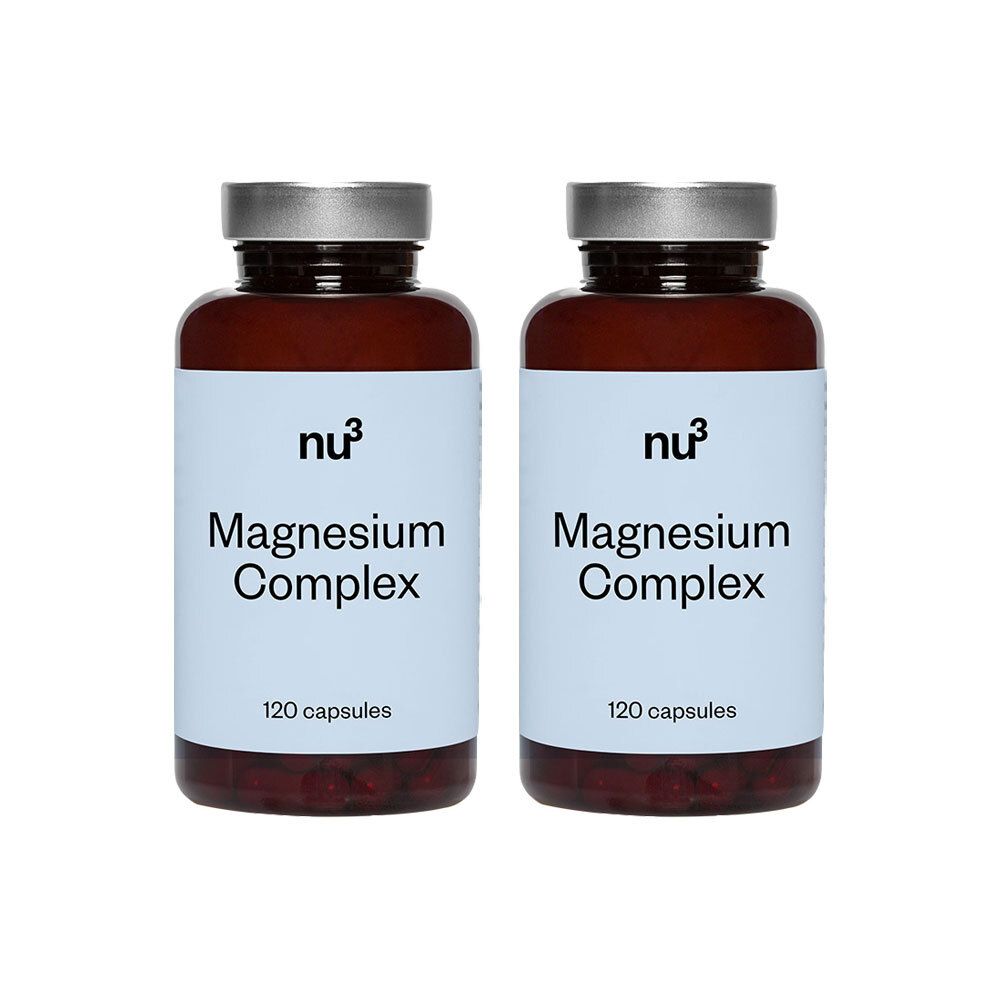 Twee flessen nu3 Magnesium Komplex. Lichtblauwe etiketten met productnaam en 120 capsules. Bruine glazen flessen met zilveren doppen.