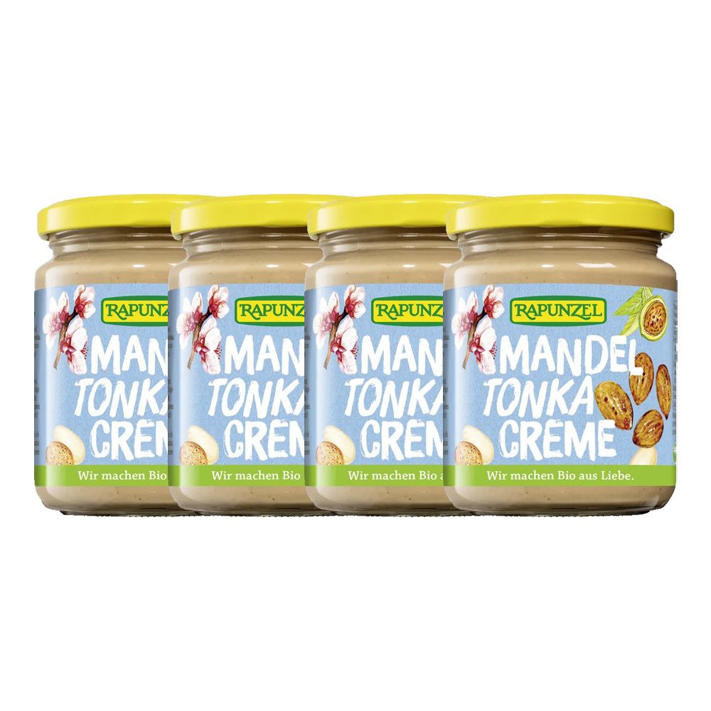 Vier potten amandel-tonka crème met gele deksels. Opschrift: RAPUNZEL, Amandel Tonka Crème. Bio kwaliteit.