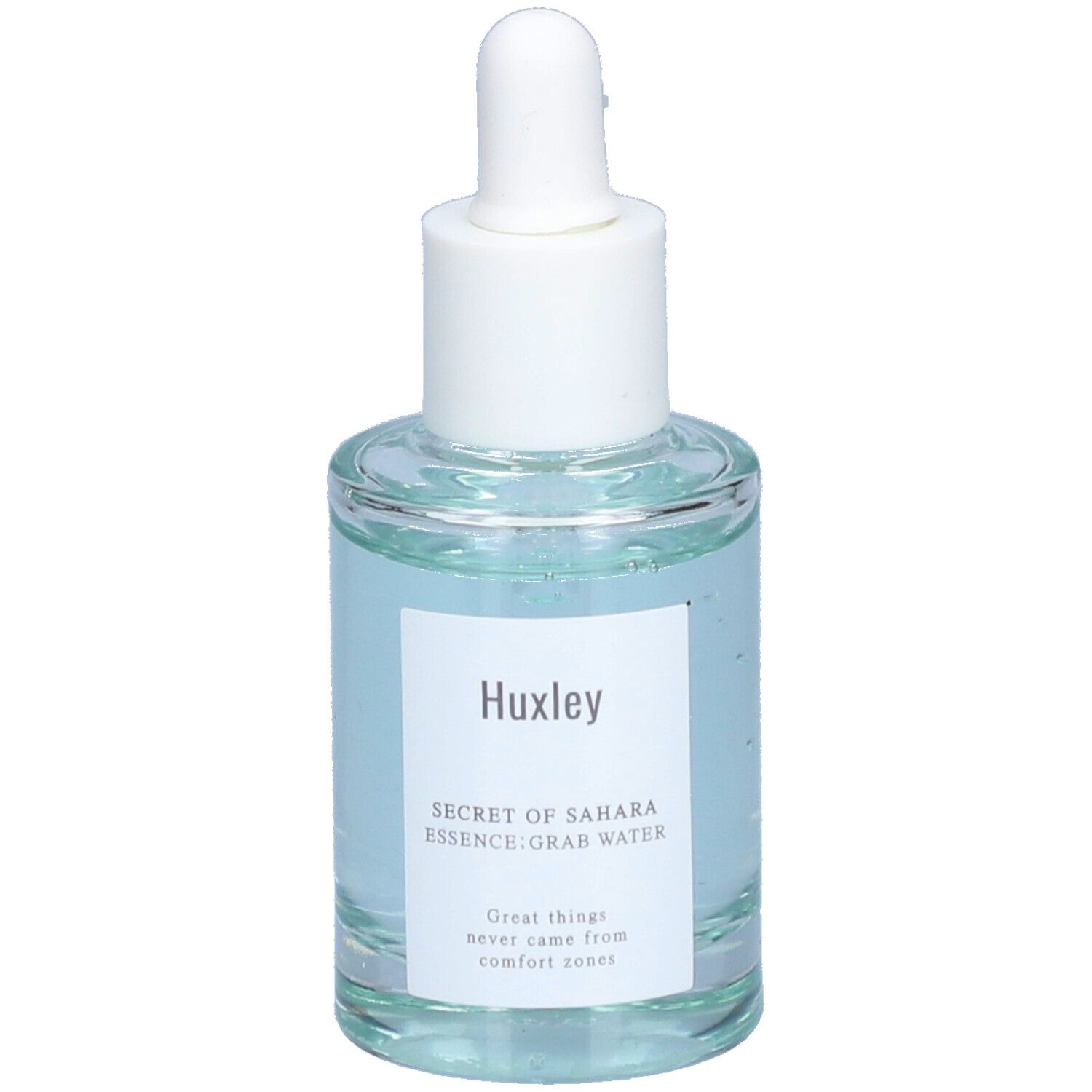 Glazen fles met blauwe vloeistof en witte dop. Etiket met "Huxley" en productnaam. Pipet.