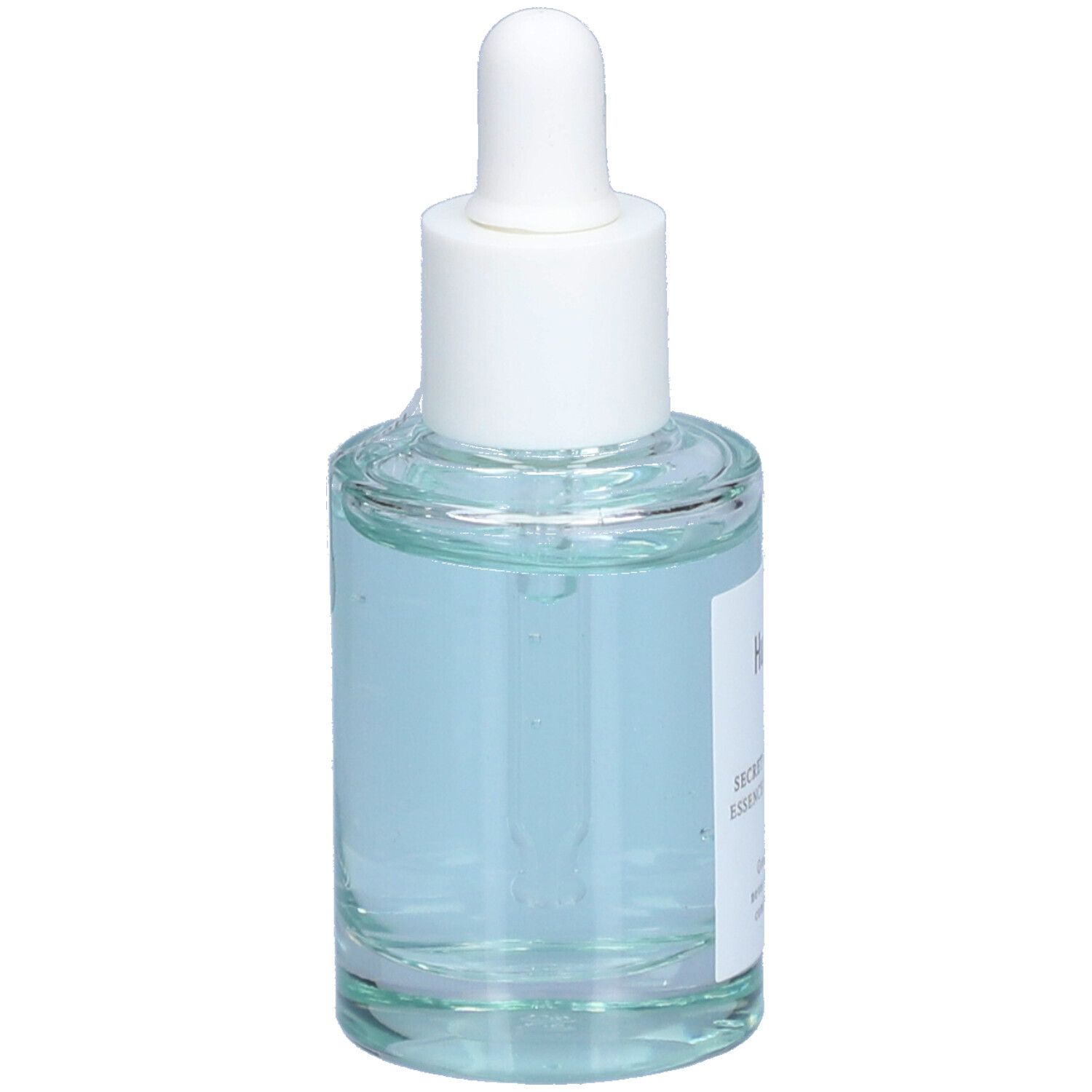 Glazen fles met blauwe vloeistof en witte dop. Etiket met "Huxley" en productnaam. Pipet.