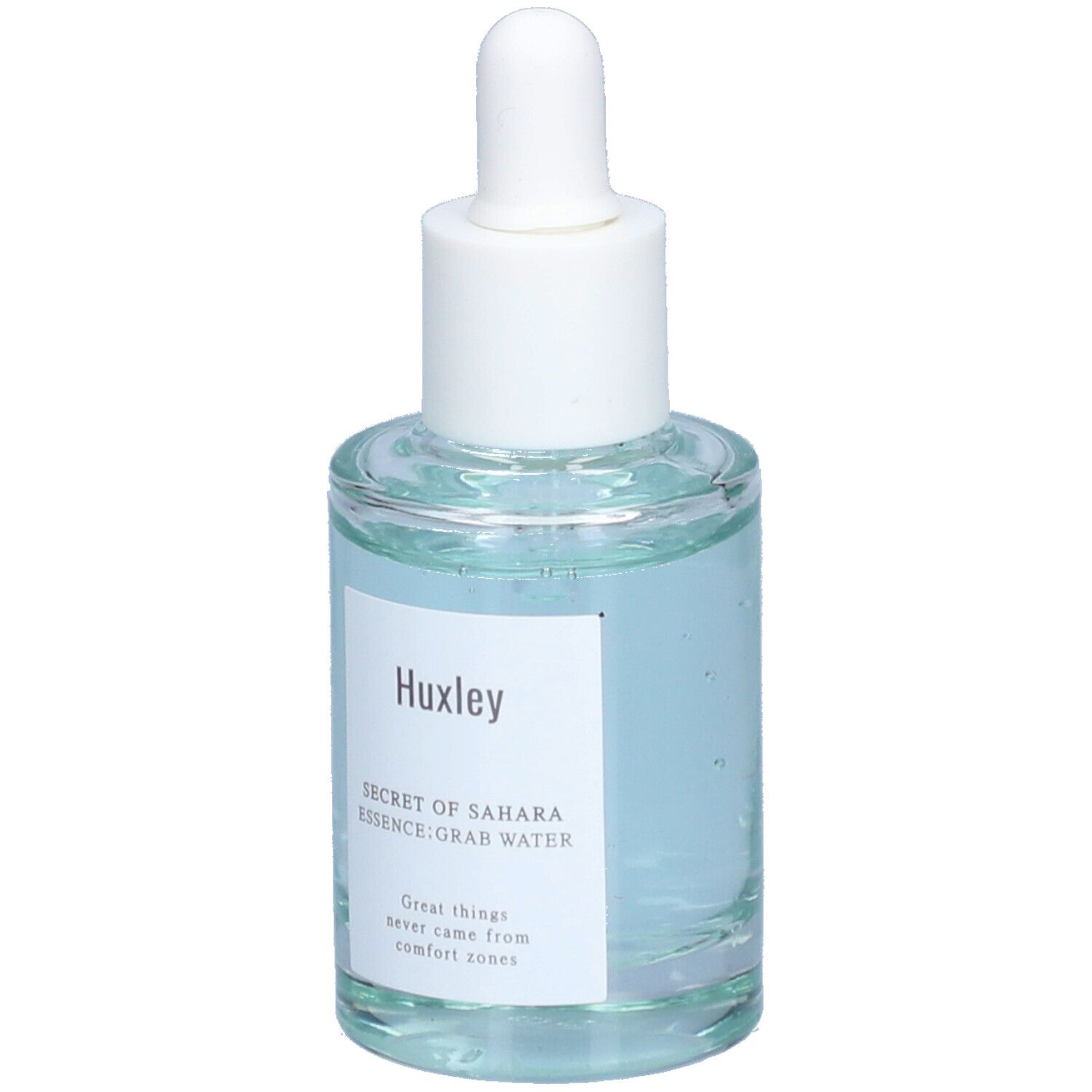 Glazen fles met blauwe vloeistof en witte dop. Etiket met "Huxley" en productnaam. Pipet.