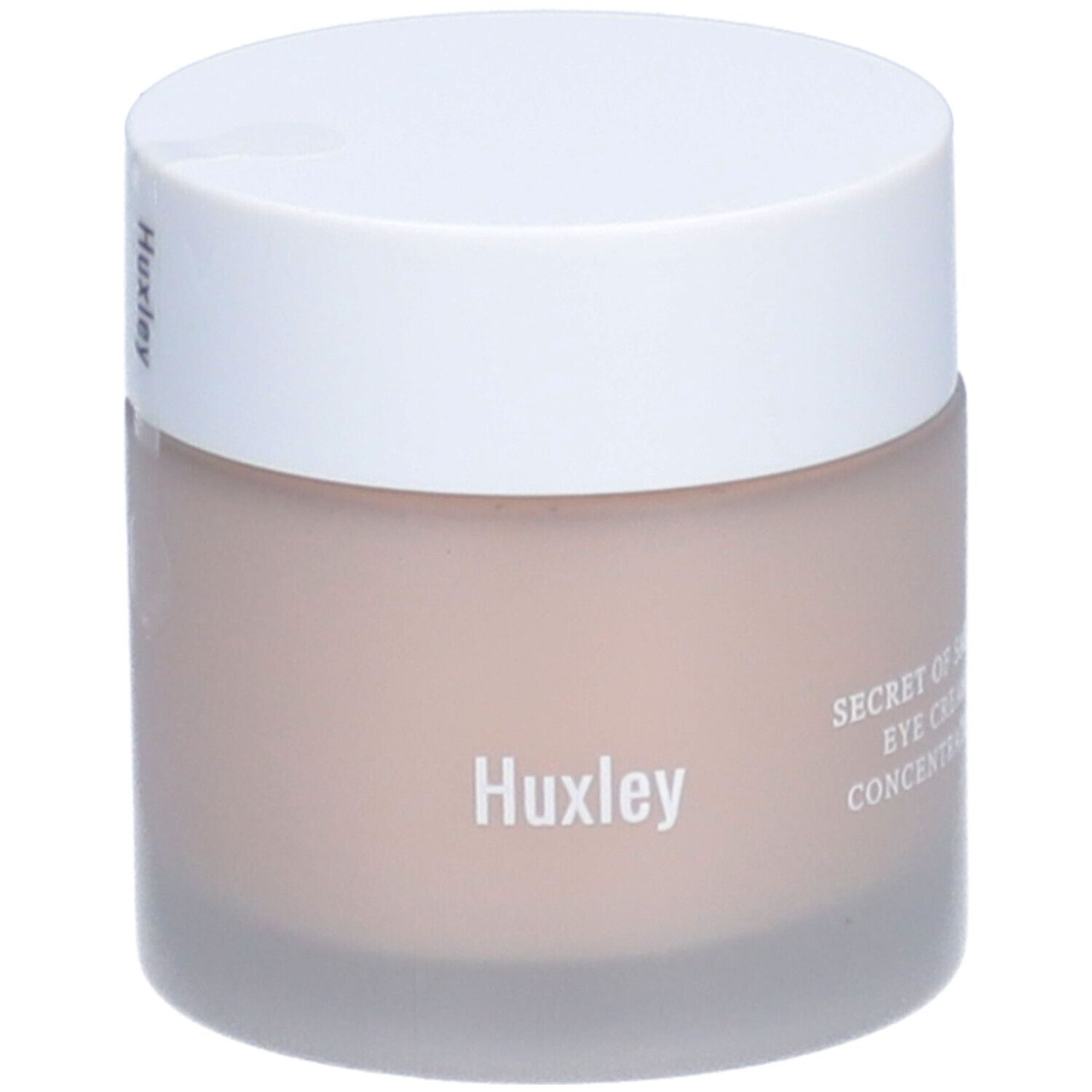 Pot avec couvercle blanc. Le pot porte les inscriptions "Huxley" et "SECRET OF SAHARA EYE CREAM CONCENTRATE".