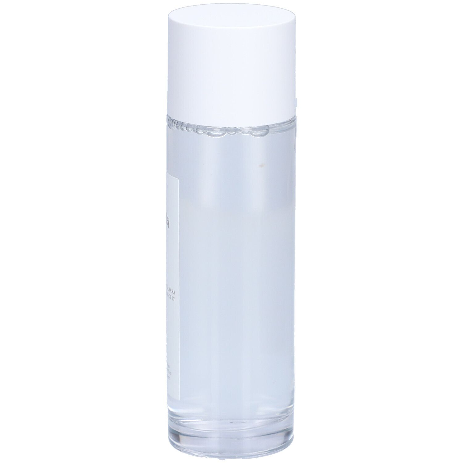 Cilindrische fles met witte dop. Etiket met productinformatie. Heldere vloeistof zichtbaar.