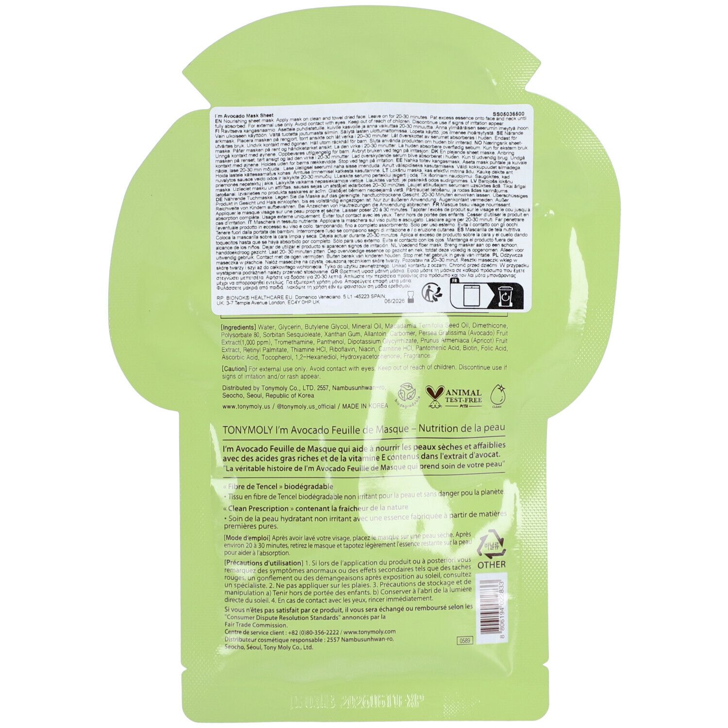 Achterkant van de groene verpakking van een gezichtsmasker met tekst in meerdere talen. Bevat informatie over ingrediënten en fabrikant.