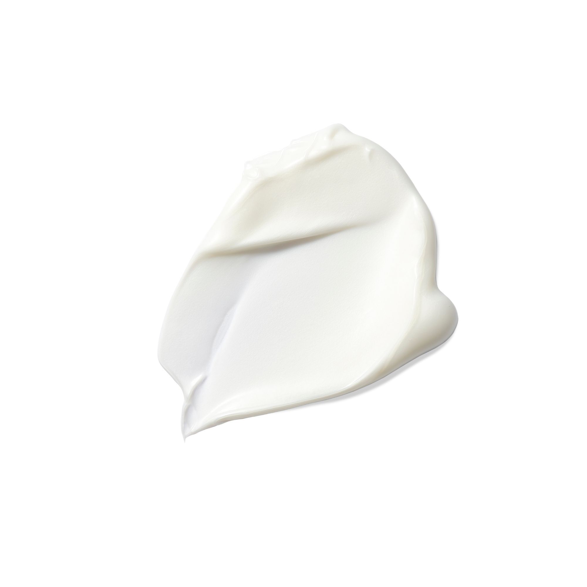 Vlek van witte crème op witte achtergrond. Gladde textuur.