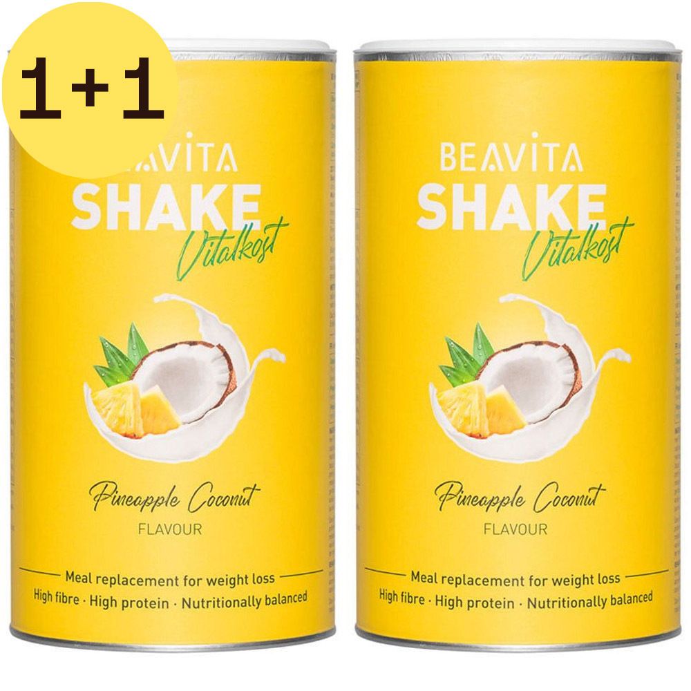 Twee gele blikken BEAVITA Shake Vitalkost, kokos-ananas. Opdruk met kokosnoot, ananas en productinformatie. Blik met deksel. 1+1 aanbieding.