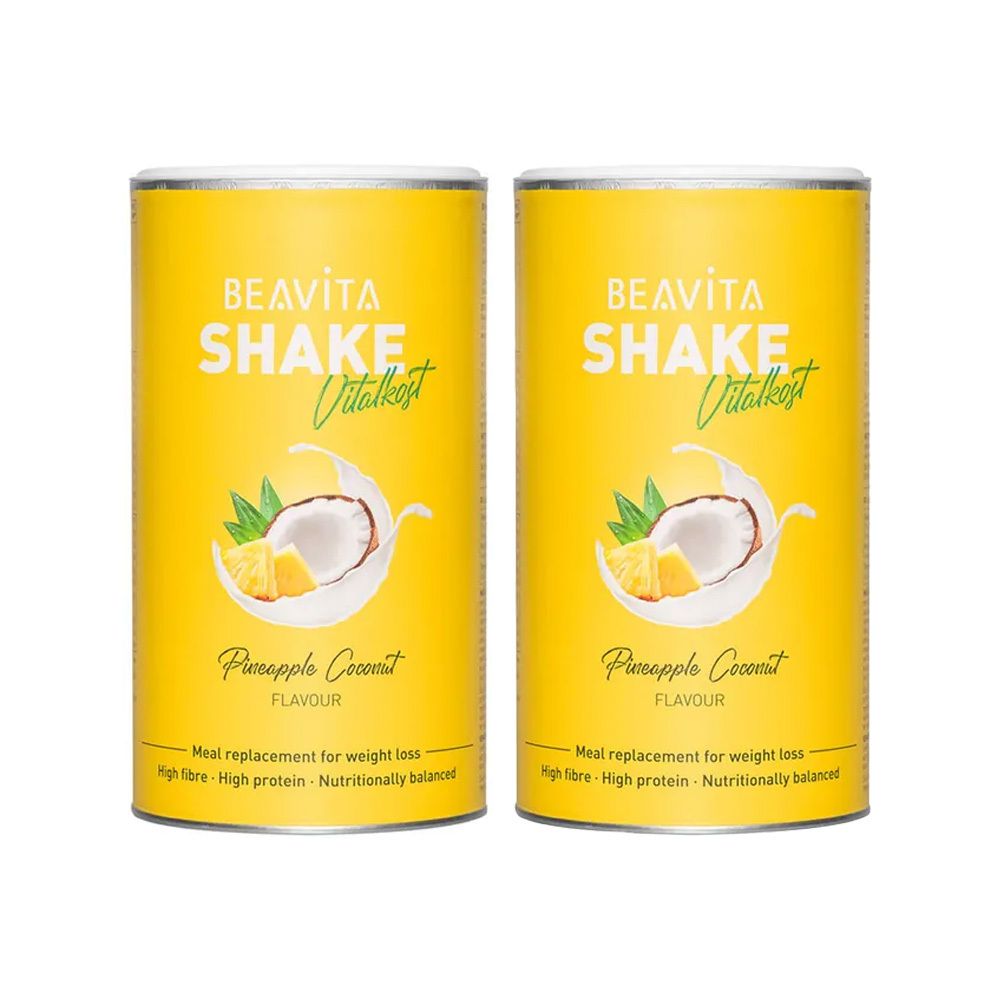 Twee gele blikken BEAVITA Shake Vitalkost, kokos-ananas. Opdruk met kokosnoot, ananas en productinformatie. Blik met deksel.