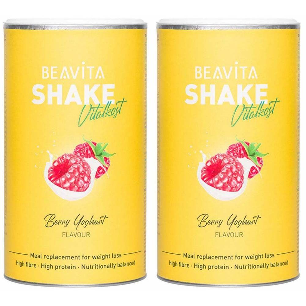Twee blikken BEAVITA Vitalkost Diät-Shake Framboos-Yoghurt met frambozen en yoghurt op een gele achtergrond.