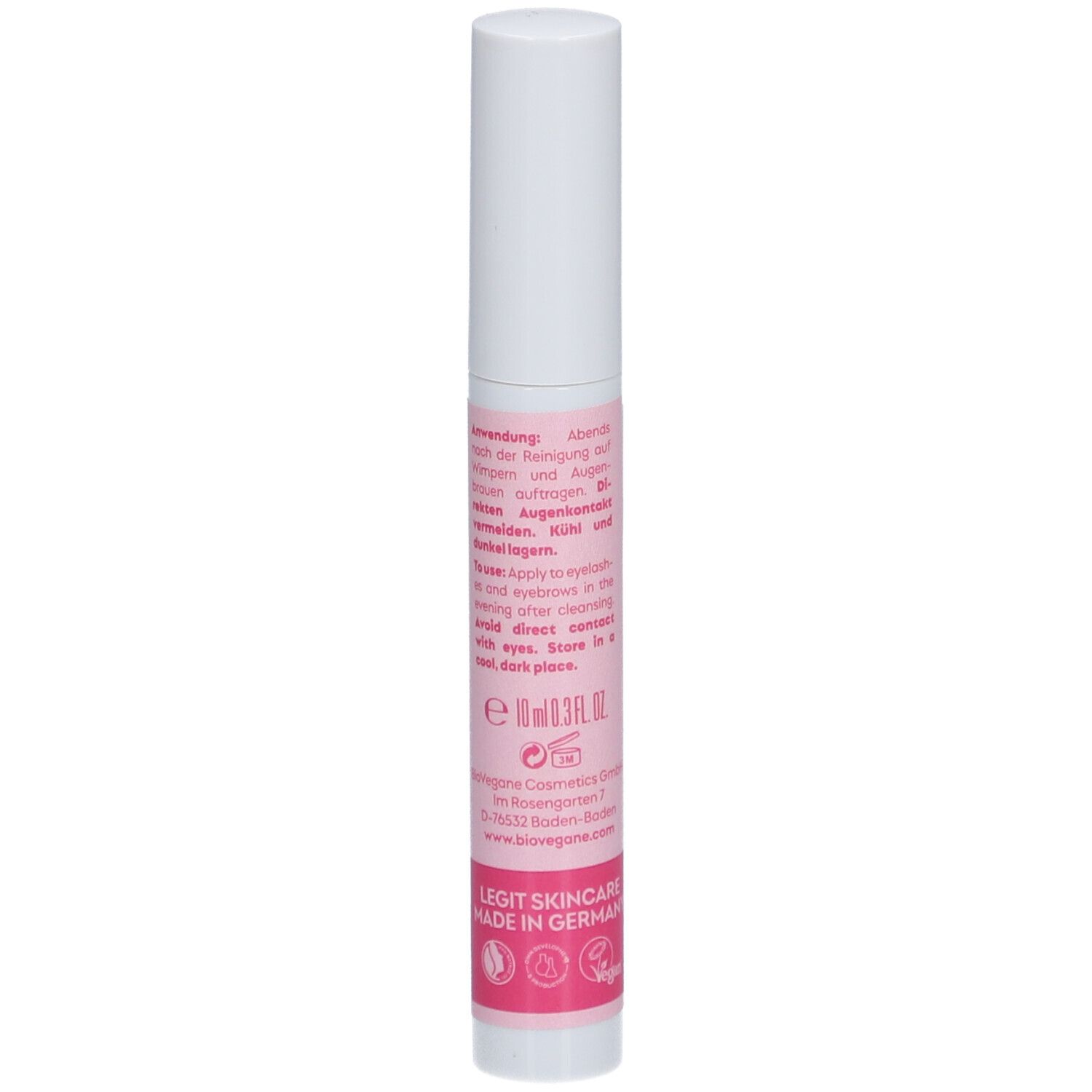 BIO:VEGANE Lash + Brow Booster. Detailweergave van de tube met tekst. Roze achtergrond, witte dop.