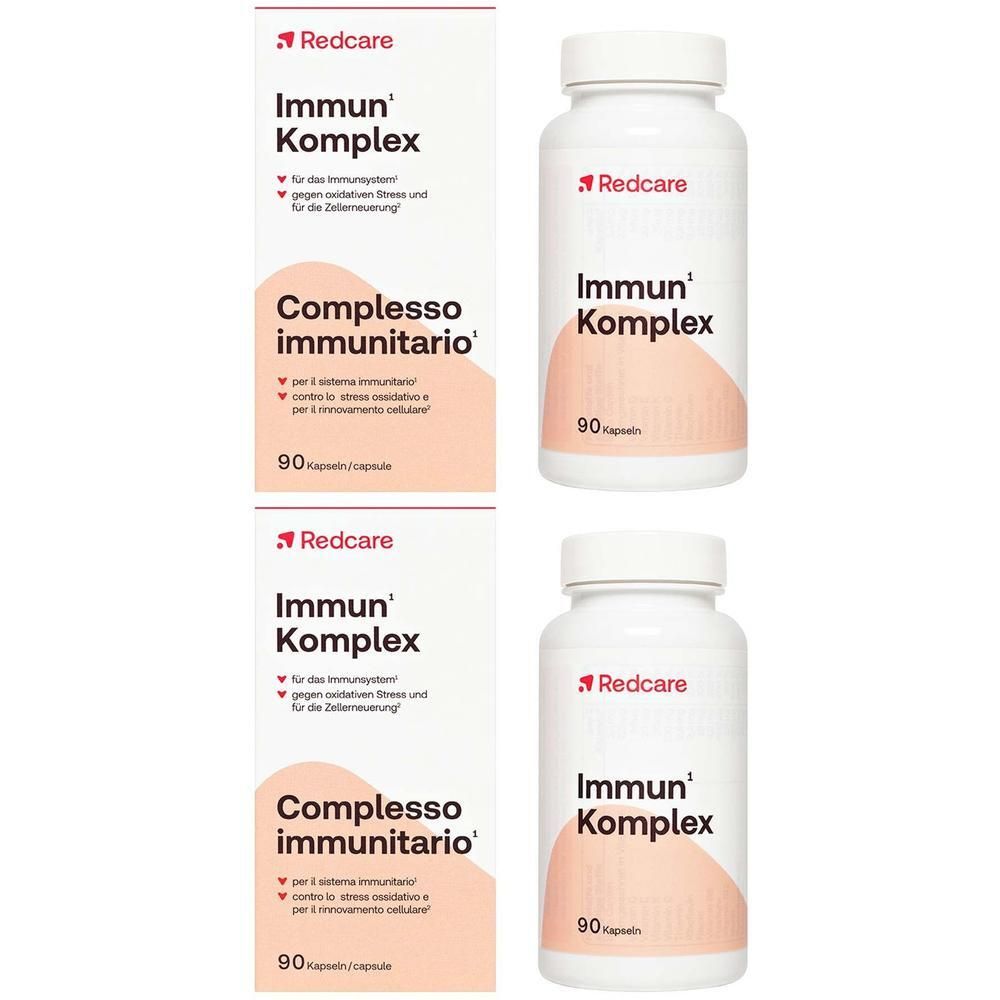 Redcare Immun Komplex: Twee verpakkingen en twee flessen met capsules, "2=1" sticker.