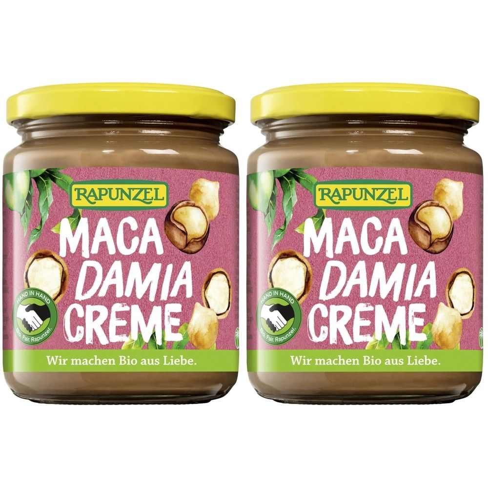 Deux pots de crème de macadamia RAPUNZEL. Crème brune dans des pots avec des couvercles jaunes. Étiquette avec texte et noix.
