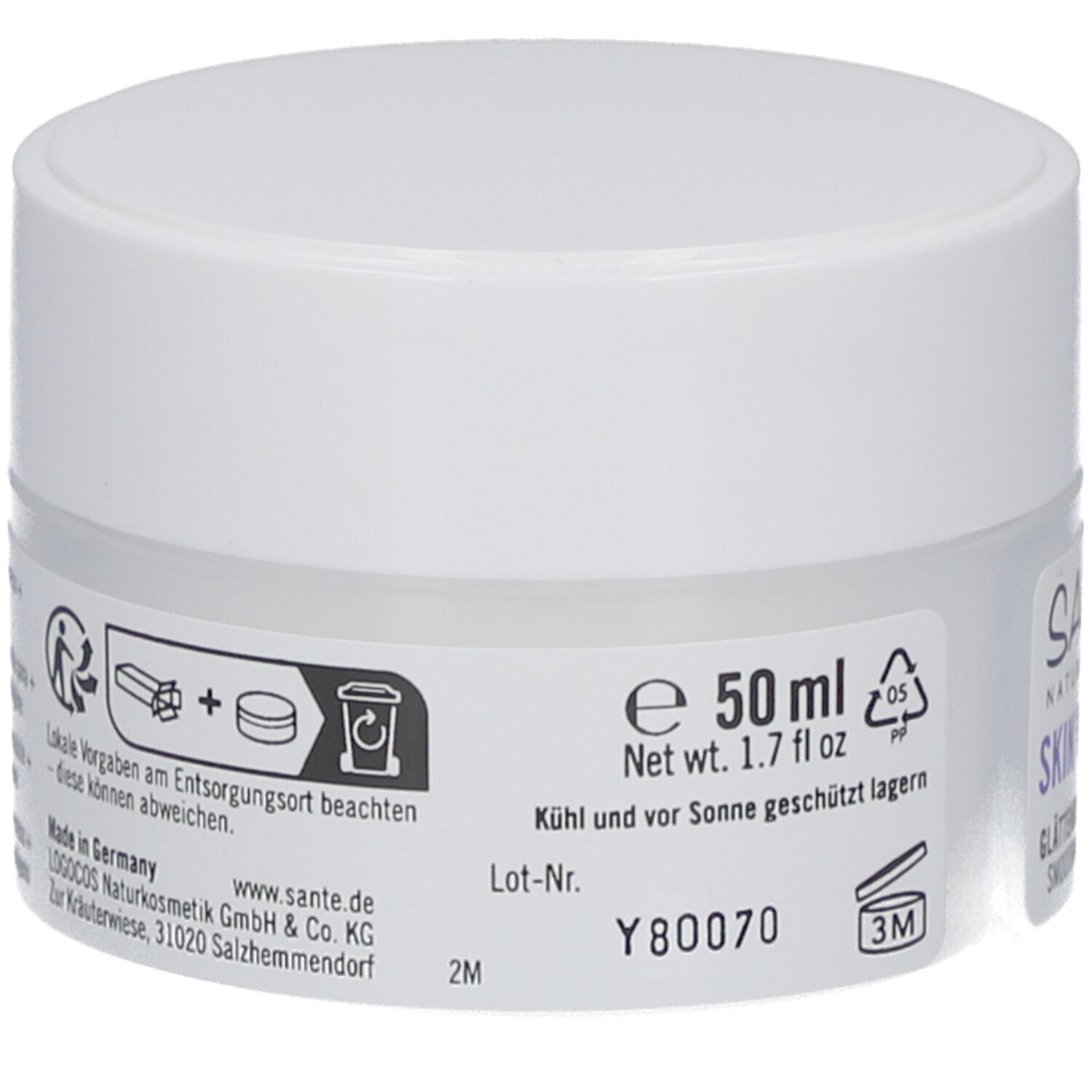 Crèmepot, witte deksel. Opschrift: 50 ml, 1.7 fl oz. Informatie over verwijdering en houdbaarheid. Fabrikant: Logocos Naturkosmetik.