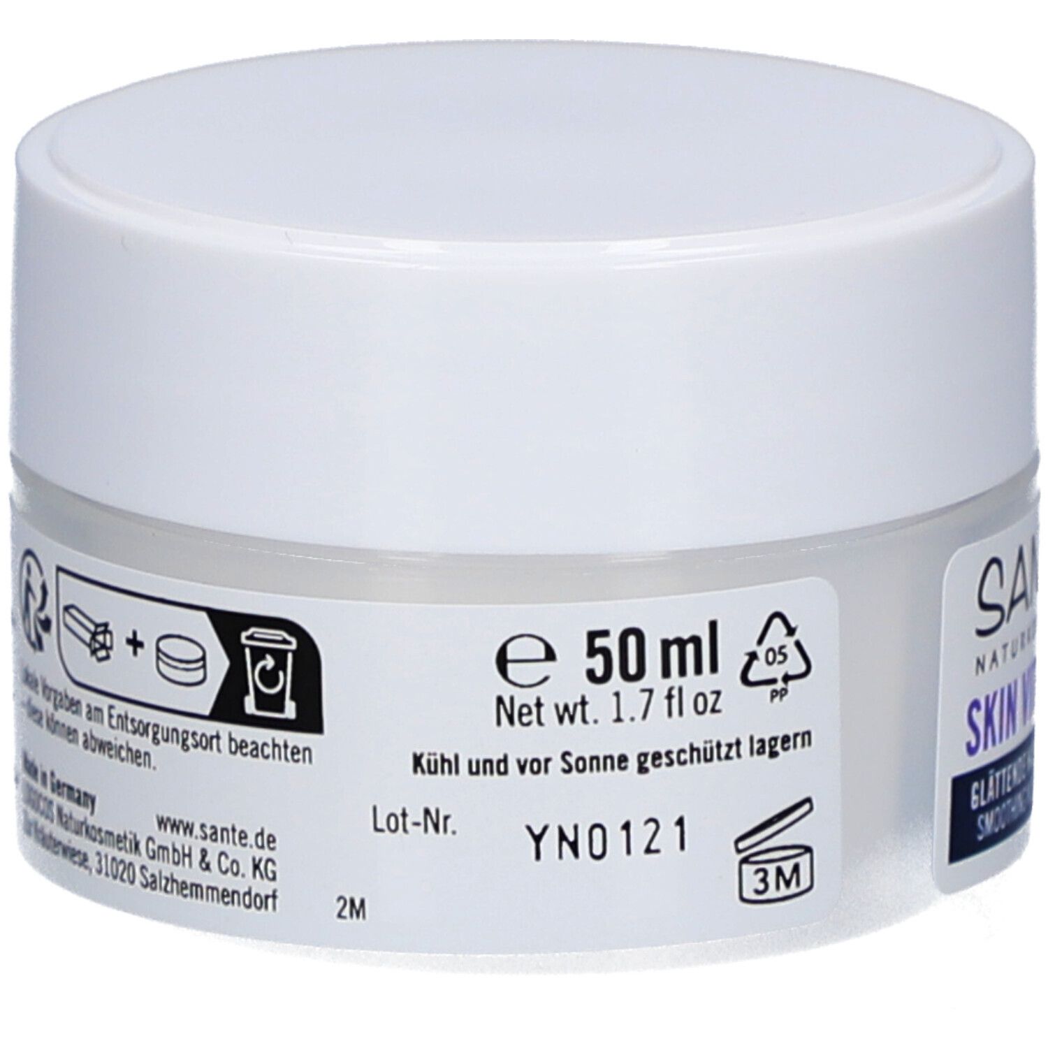 Witte crème pot. Achterkant met informatie. 50 ml. Houdbaarheidssymbool. Gemaakt in Duitsland.