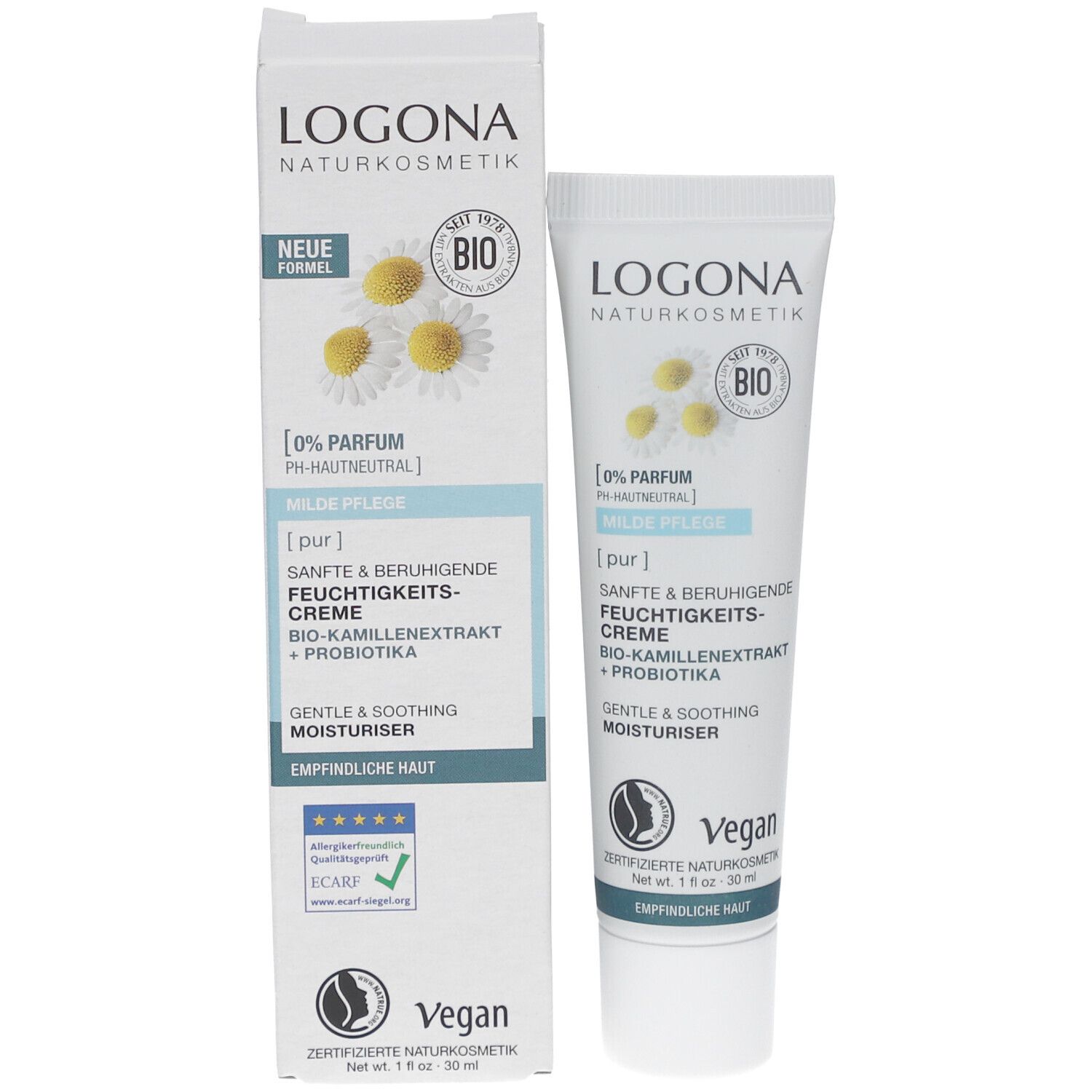Productverpakking met crèmetube en doos. LOGONA-logo, kamillebloemen, tekst. Vegan, gevoelige huid.