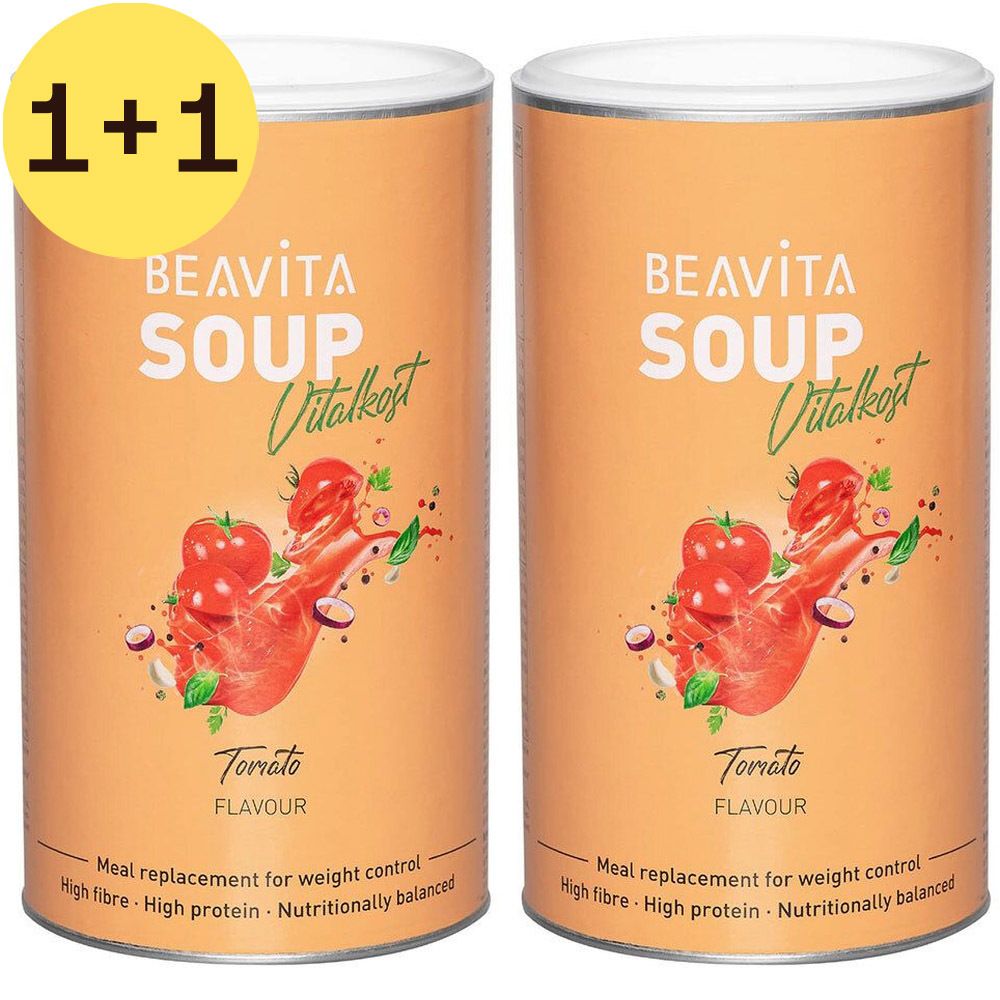 Twee blikken BEAVITA soep, tomaat, met 1+1 aanbieding. Opschrift: BEAVITA, SOUP, Vitalkost, Tomate, Meal replacement for weight control, High fibre, High protein, Nutritionally balanced.