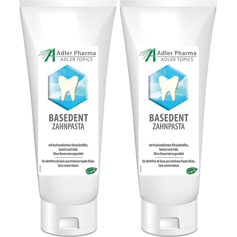 Twee witte tubes tandpasta. Groen logo en tekst: BASEDENT ZAHNPASTA. Merk Adler Pharma. Zonder conserveringsmiddelen.