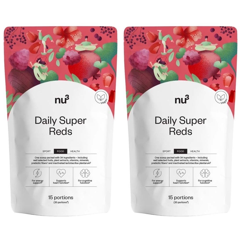 Deux sachets de "Daily Super Reds". Motif floral rouge en haut. Texte "15 portions" en bas. Le logo "nu3" est visible.