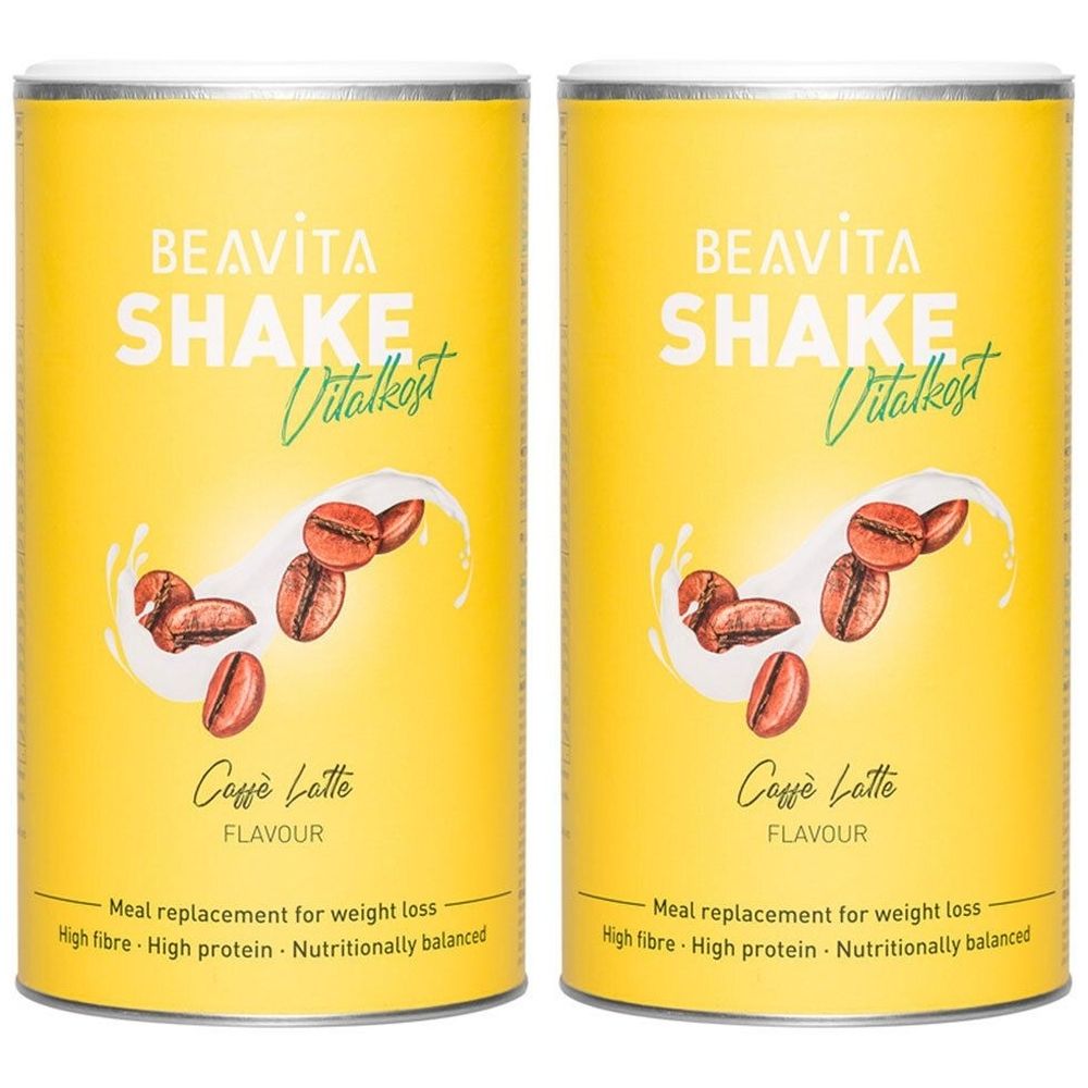 Twee gele blikken met BEAVITA SHAKE Vitalkost. Afbeelding van koffiebonen en tekst Caffè Latte.