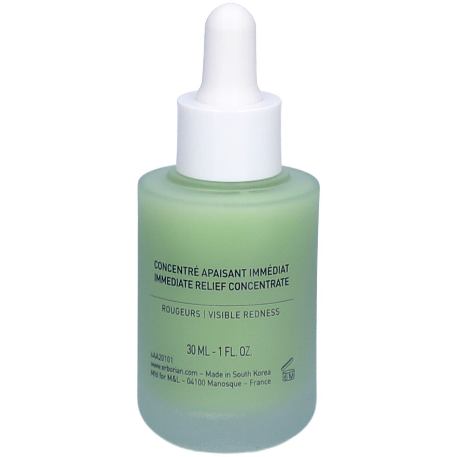 Groene glazen fles met witte dop en pipet. Opschrift CONCENTRÉ APAISANT IMMÉDIAT. 30 ml.