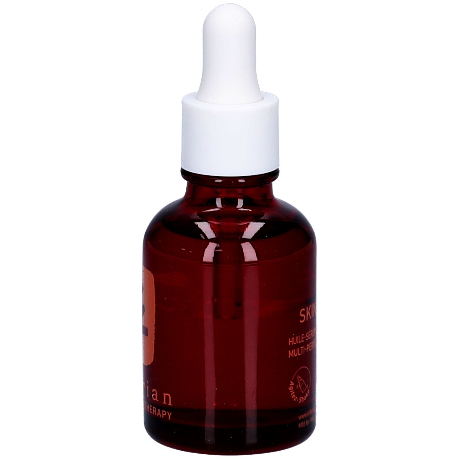 Bruine glazen fles met witte dop en pipet. Opschrift: Skin Therapy, nachtolie. Logo: boom.
