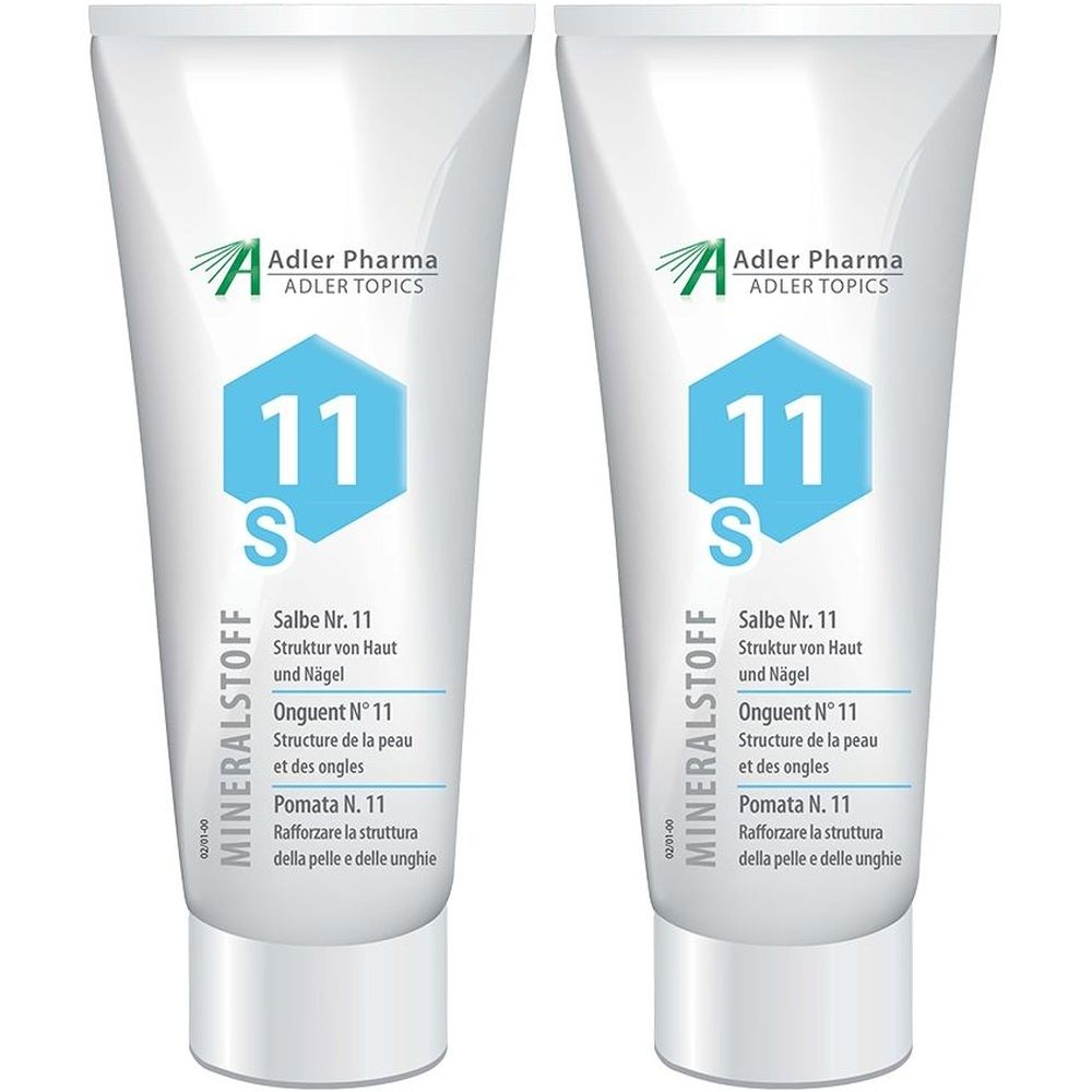 Twee tubes MINERALSTOFF Zalf Nr. 11 van Adler Pharma. Witte tubes met blauwe zeshoekige grafiek en productinformatie.