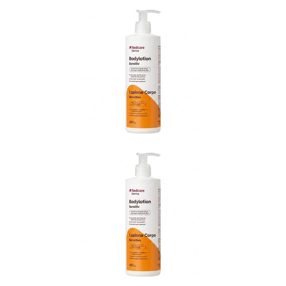 Deux flacons pompe blancs Redcare Derma Bodylotion Sensitiv avec étiquette orange.