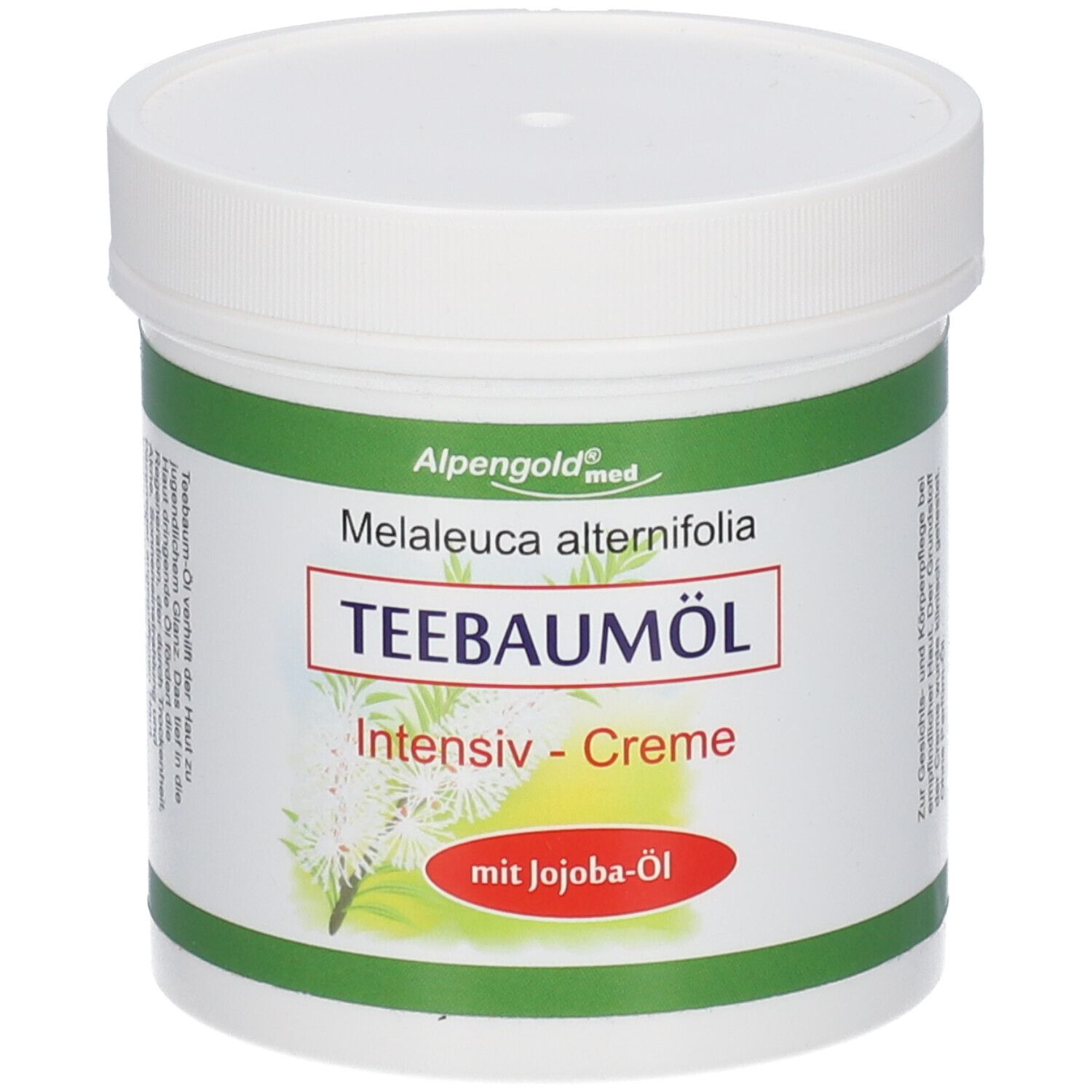 Witte pot met groen en rood etiket. Opschrift: Teebaumöl Intensiv-Creme mit Jojoba-Öl. Merk: Alpengold med.
