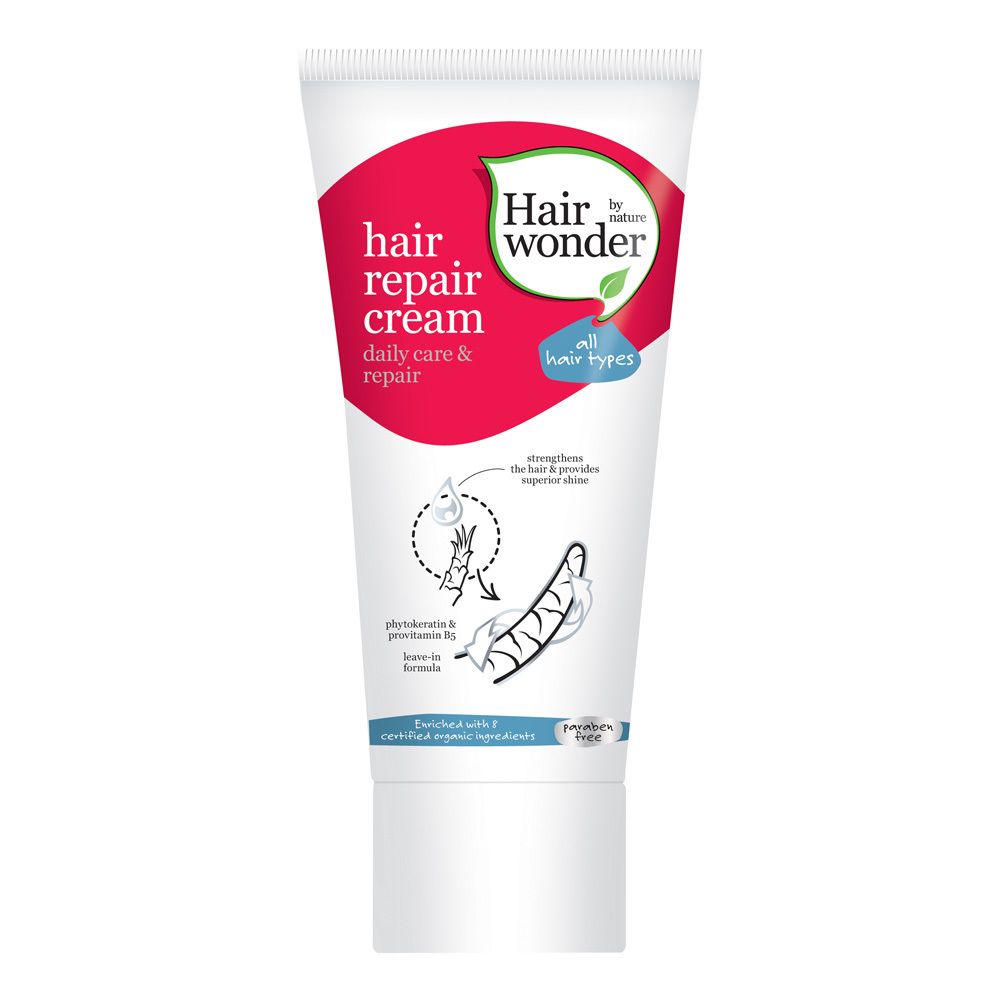 Tube de crème capillaire. Blanc, avec design rouge et vert. Texte: Hair Wonder, Hair Repair Cream, soin quotidien & réparation.