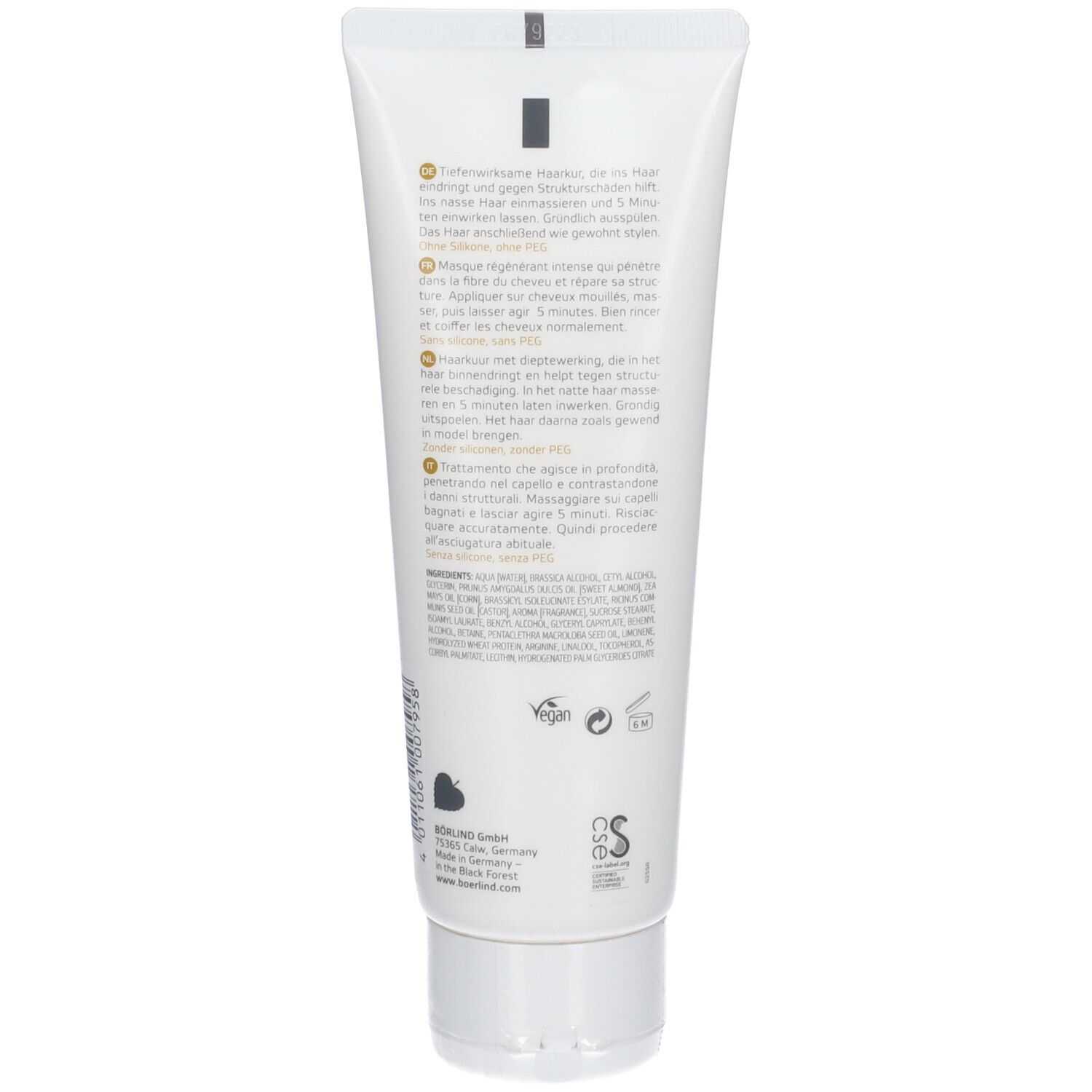 Witte tube met "ANNEMARIE BÖRLIND" en "hair mask". Gouden streep. Tekst in het Duits, Frans, Nederlands en Italiaans.