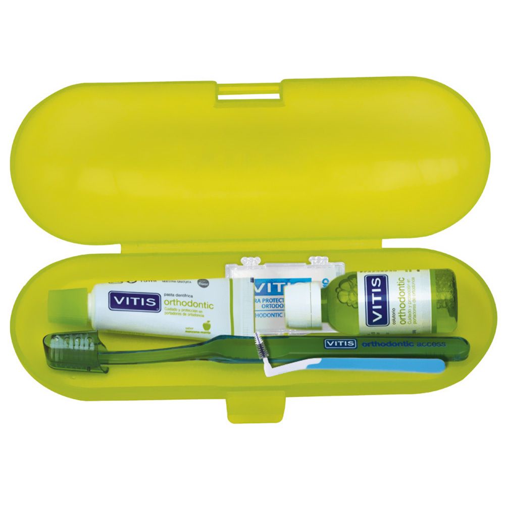 Groene etui met tandpasta, tandenborstel, mondspoeling en accessoires. VITIS orthodontic.