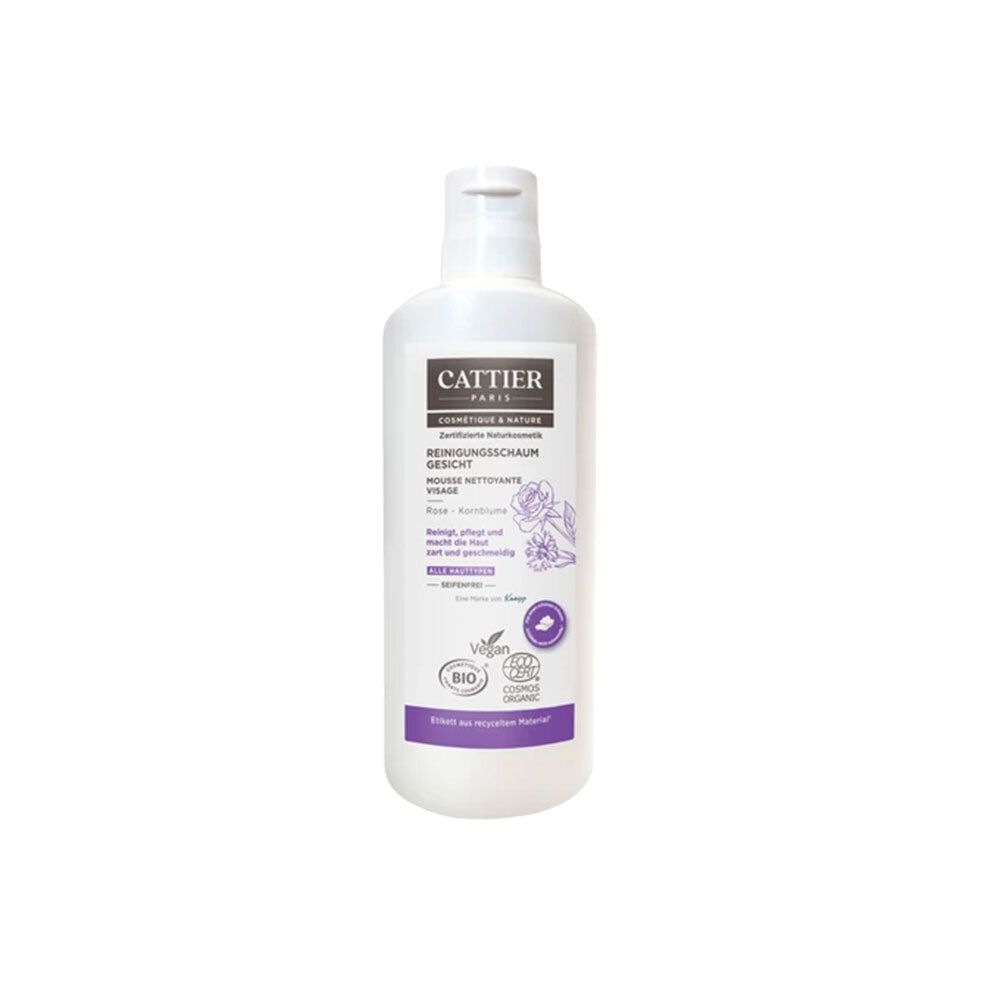 Witte fles met paars etiket. Tekst: CATTIER, Reinigingsschuim gezicht, Roos & Korenbloem. Bio-certificering.
