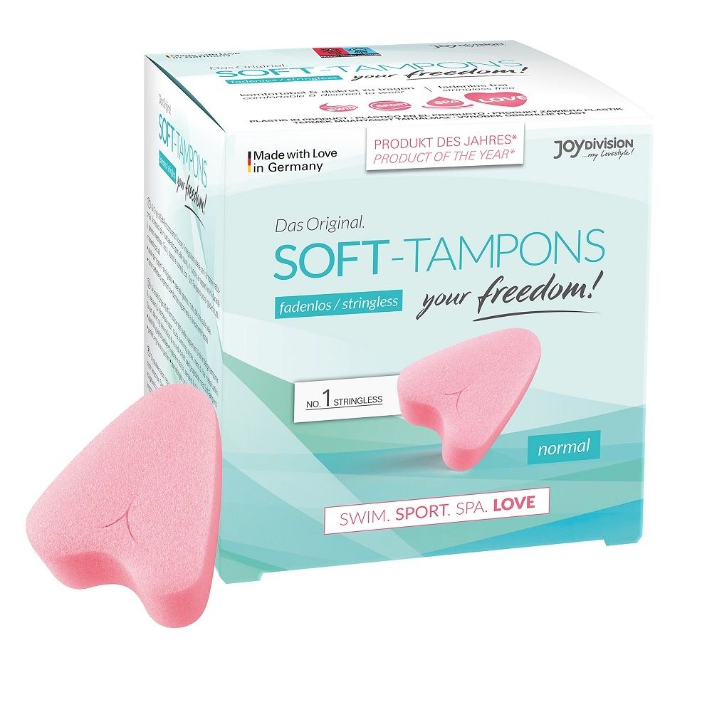Roze, hartvormige Soft-Tampons en verpakking. Opschrift: SOFT-TAMPONS, zonder draad, normaal. Product van het jaar. Made in Germany.