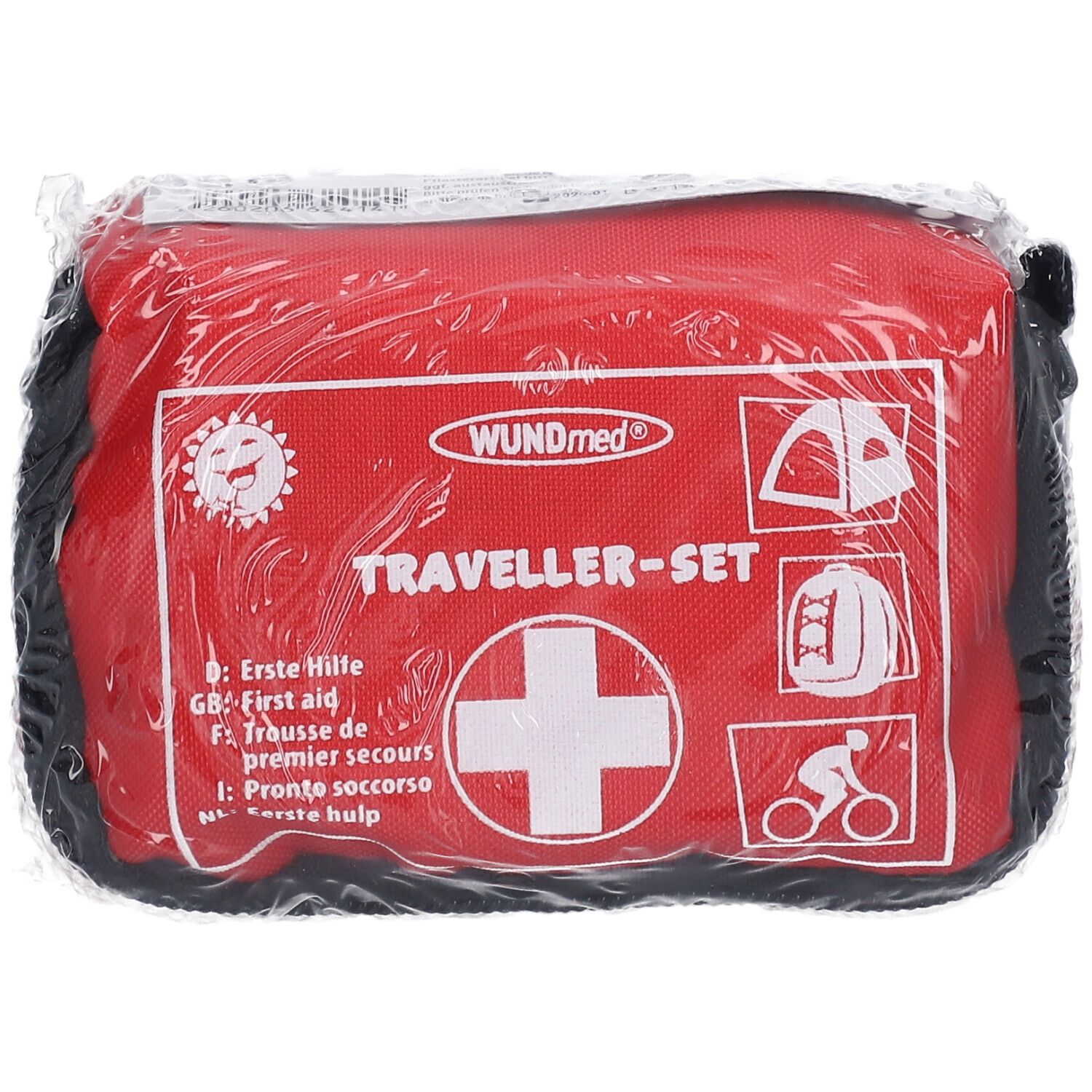 Rode tas met wit kruis en opschrift 'Traveller-Set'. Bevat 32 delen. Verpakt in folie.