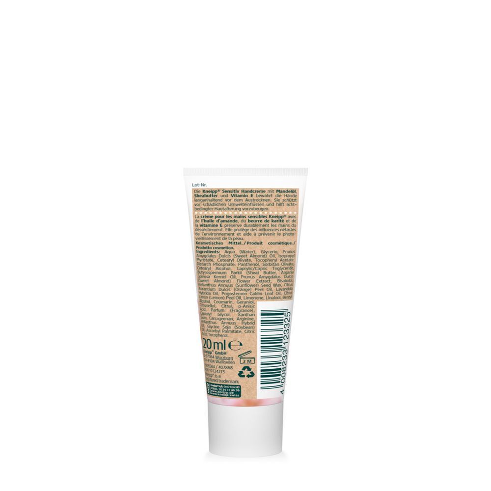 Achterkant van de handcrèmetube. Tekst: ingrediënten, fabrikantinfo, lotnummer, barcode. 20 ml. Recyclingsymbool.