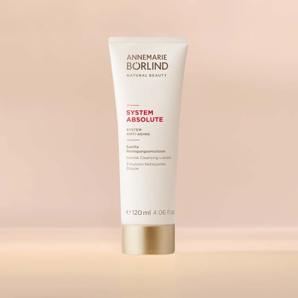 Witte tube met productnaam en -aanduiding. Gouden sluiting. 120 ml.