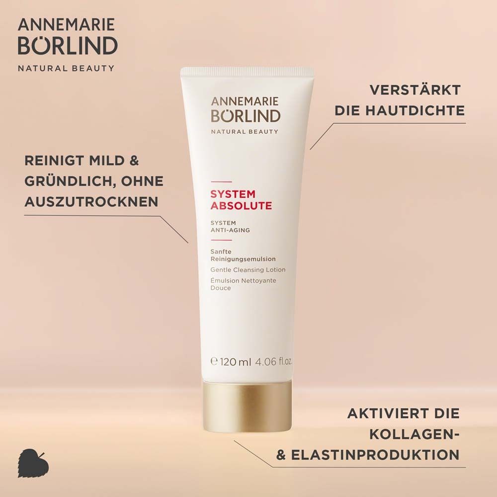 Witte tube met productnaam en -aanduiding. Gouden sluiting. Tekstuele aanwijzingen.