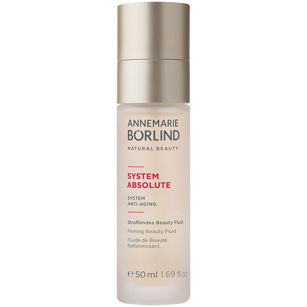 Beauty Fluid van ANNEMARIE BÖRLIND. Fles met gouden dop. Opschrift: SYSTEM ABSOLUTE, Straffendes Beauty Fluid.