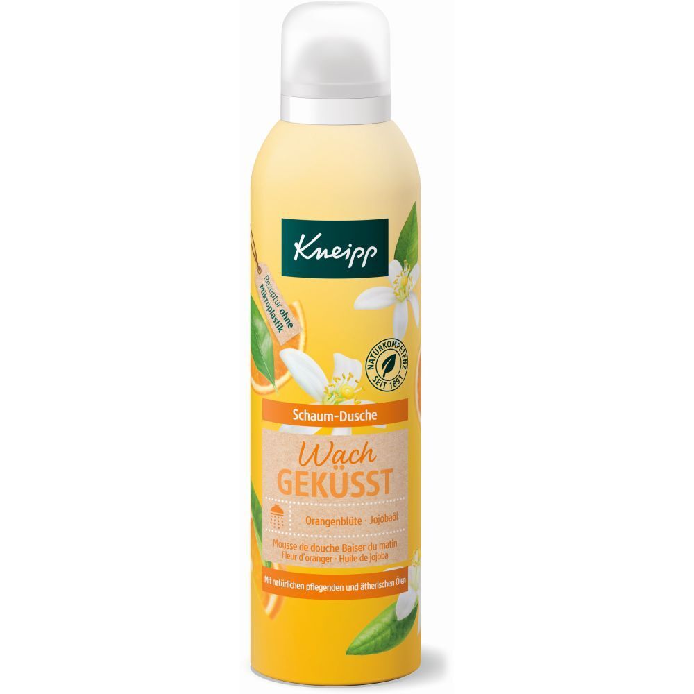 Gele fles met witte dop. Opschrift: Kneipp Schaum-Dusche Wachgeküsst. Sinaasappelbloesem motief.