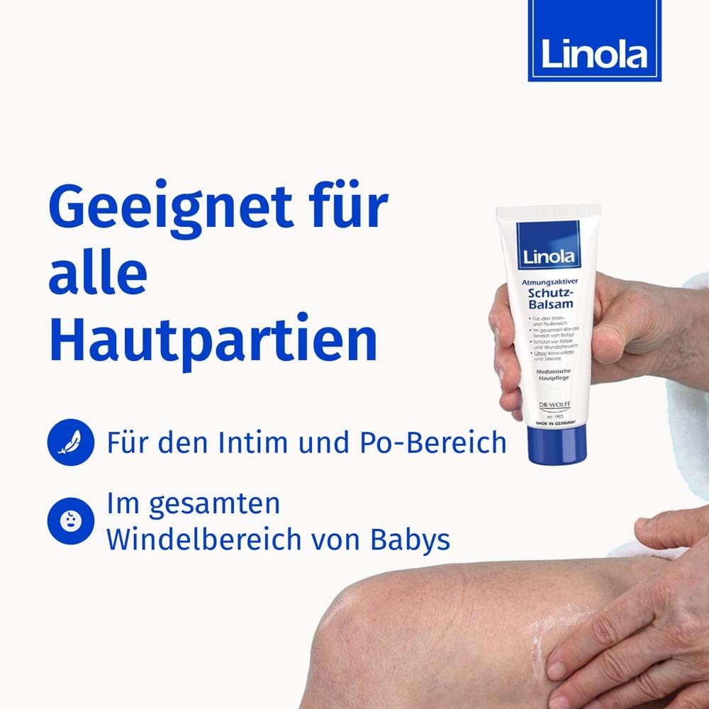 Persoon houdt Linola Beschermende balsem tube vast. Geschikt voor alle huidzones. Intieme zone, baby's.