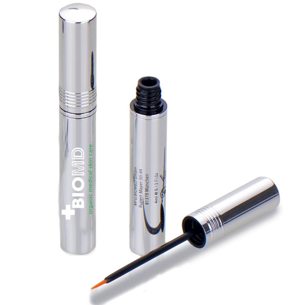Zilverkleurige fles en applicator. Zwarte punt. Open fles met borstel. BIOMD-logo.