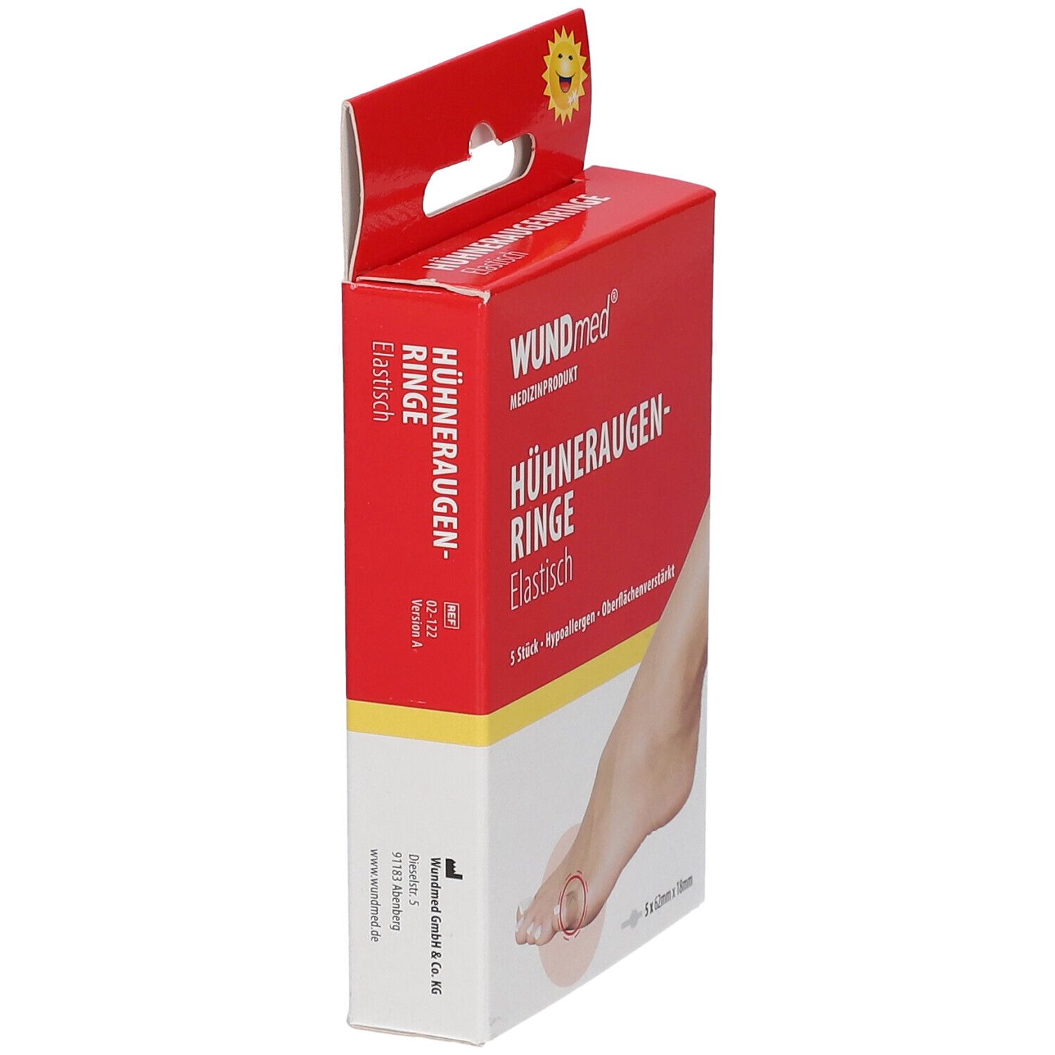 Schuine weergave van de WUNDmed Hühneraugenringe verpakking. Rode doos met productinformatie en voetillustratie.