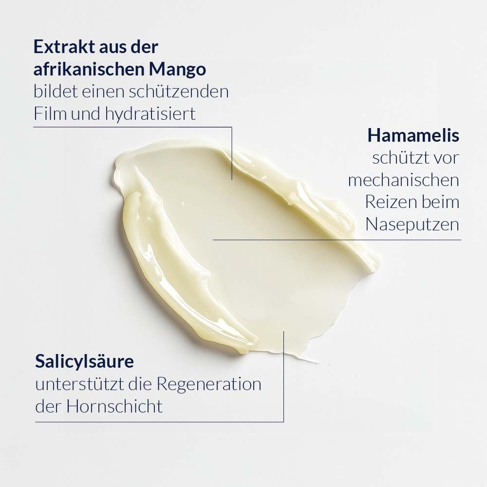 Close-up van crème. Gelabeld met ingrediënten: mango-extract, hamamelis, salicylzuur.